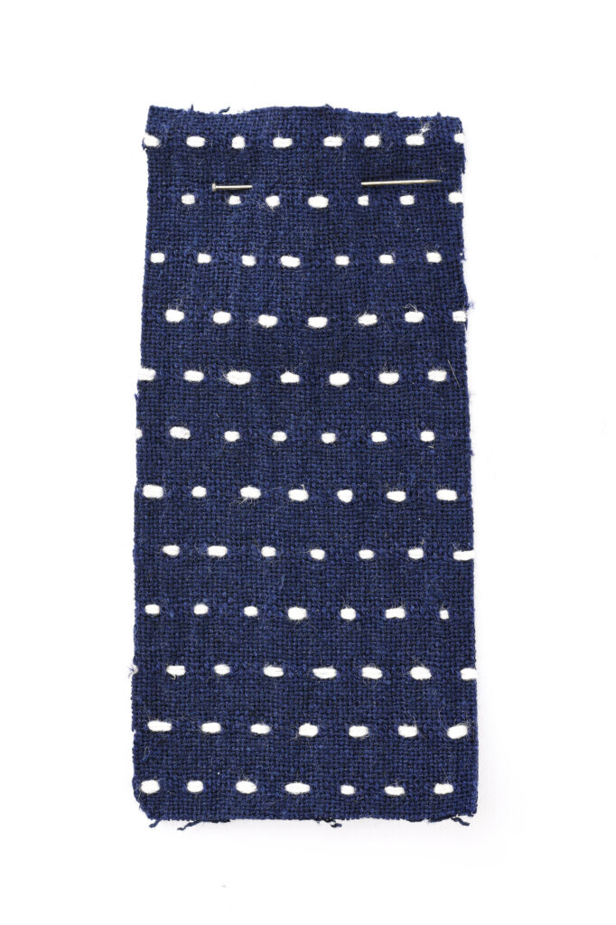 PIC A PIC double weave with white horizontal stitches